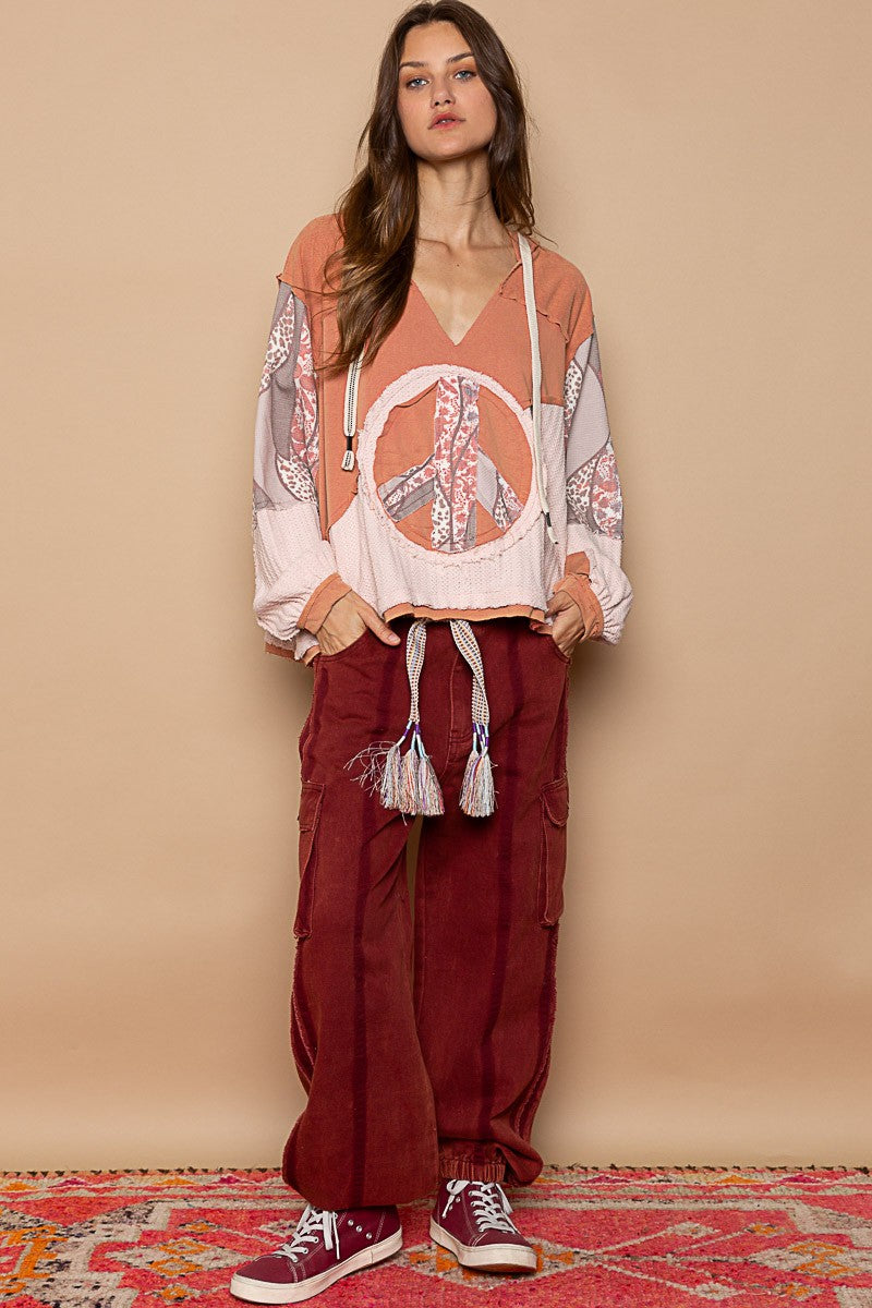 Always ready hooded woven peace knit top